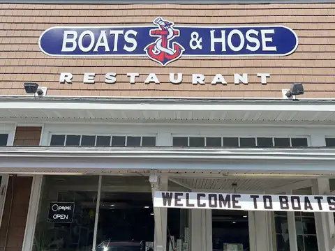 Boats & Hose At Chapel Cove in Taylors Island